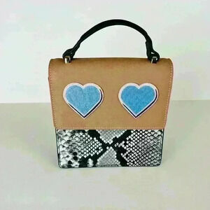 Anthropologie Jules Kae Snake Print Bag with Hearts.